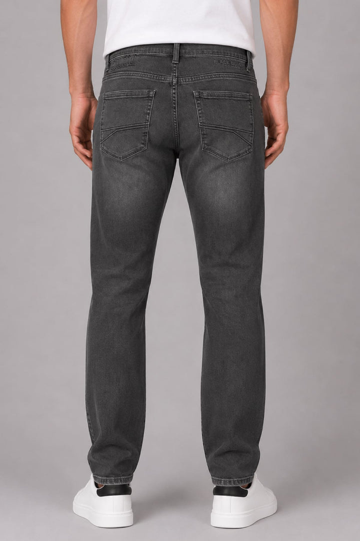 Vue latérale jean coupe moderne Black Bull homme bleu avec coutures apparentes - Valérie Simon