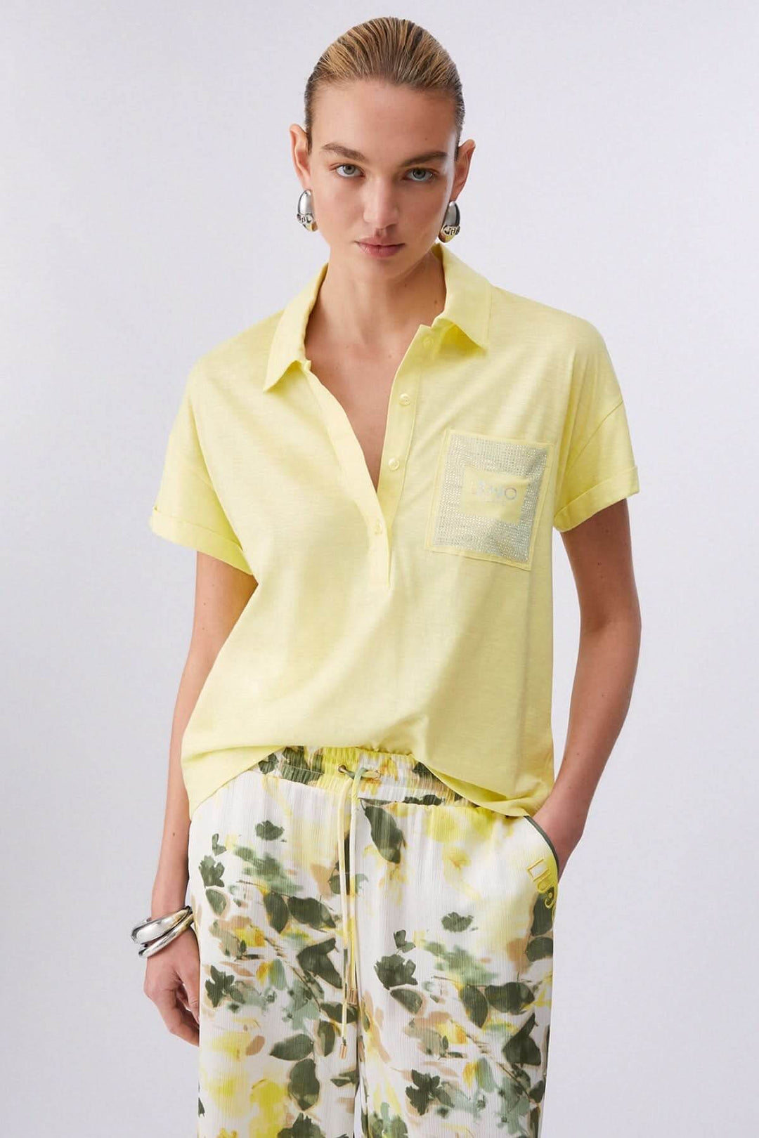 Polo à manches courtes avec poche décorative