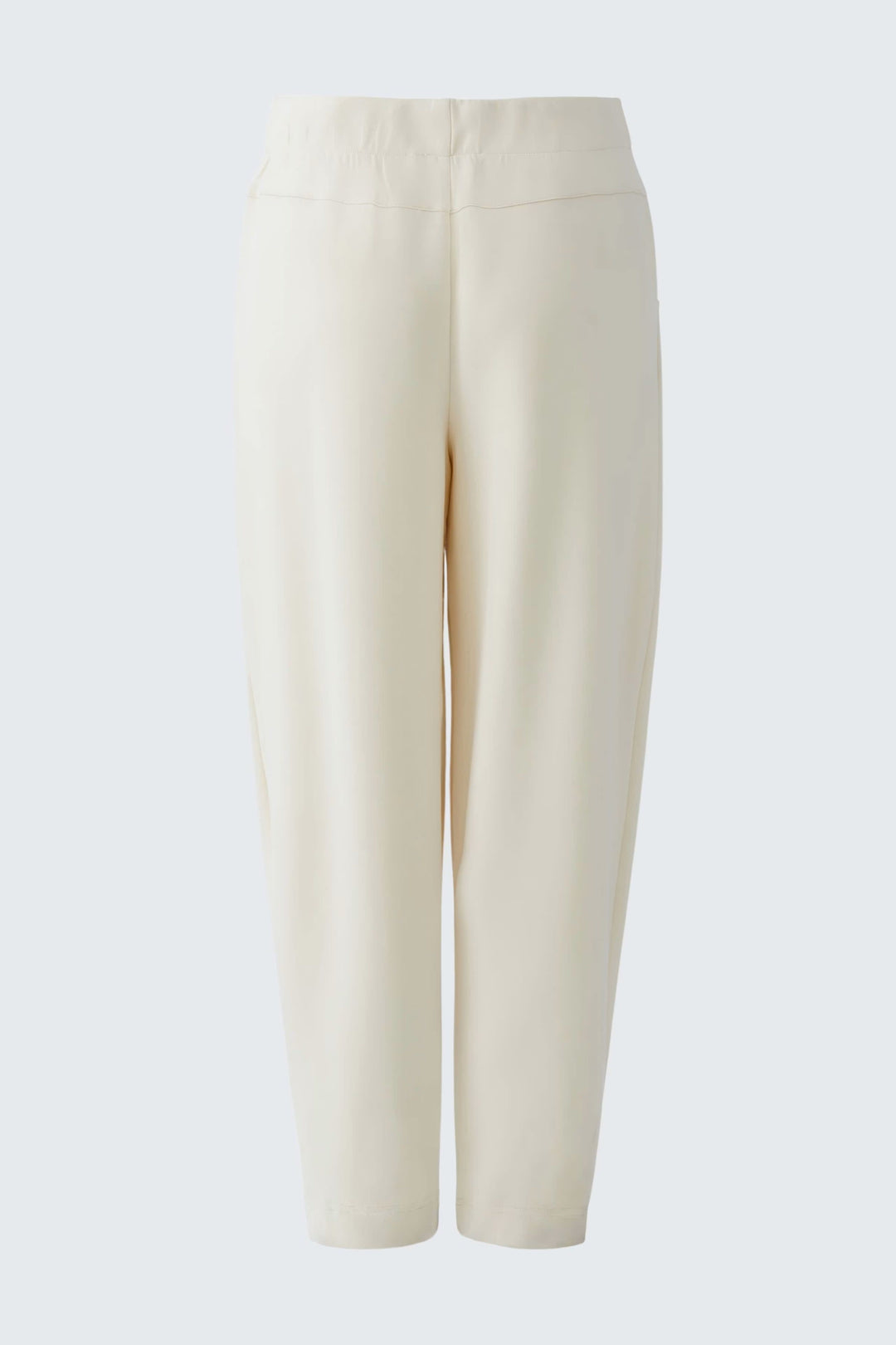 Vue de côté pantalon jogging chic à enfiler Oui beige avec bandes latérales et poches pour femme - Valérie Simon