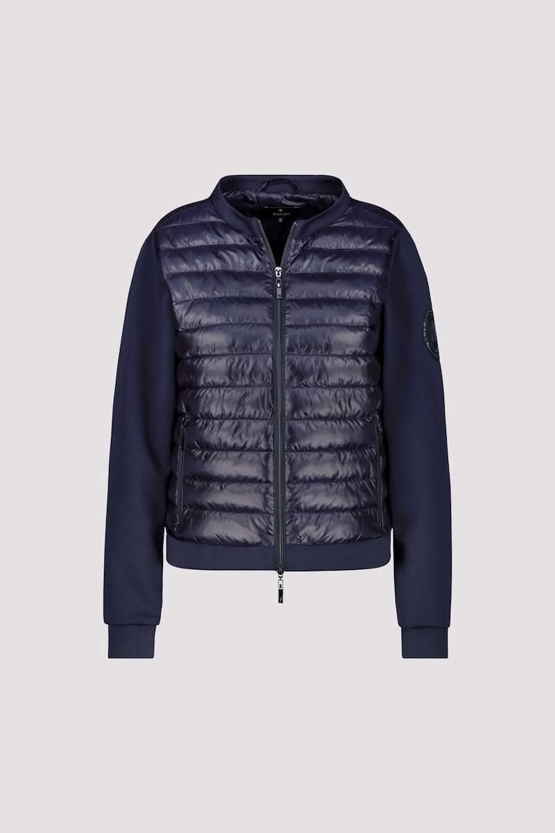 Veste matelassée bimatière à fermeture éclair avec corps matelassé et manches souples, idéal pour un style chic et sportif.