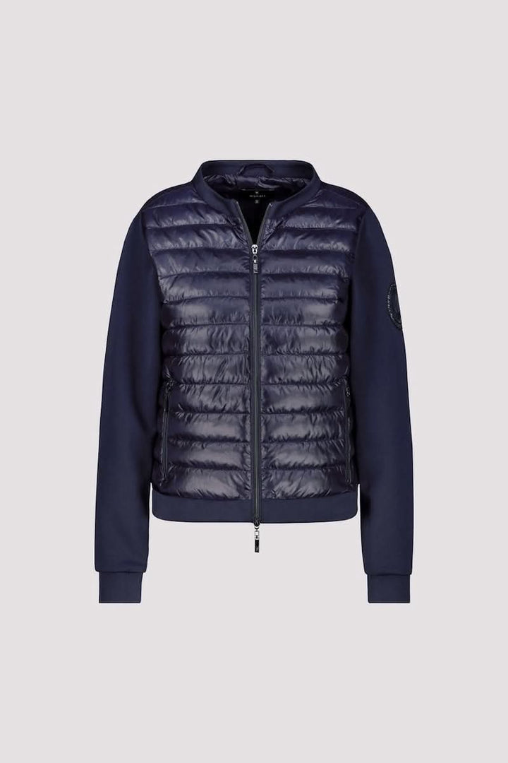 Veste matelassée bimatière à fermeture éclair avec corps matelassé et manches souples, idéal pour un style chic et sportif.