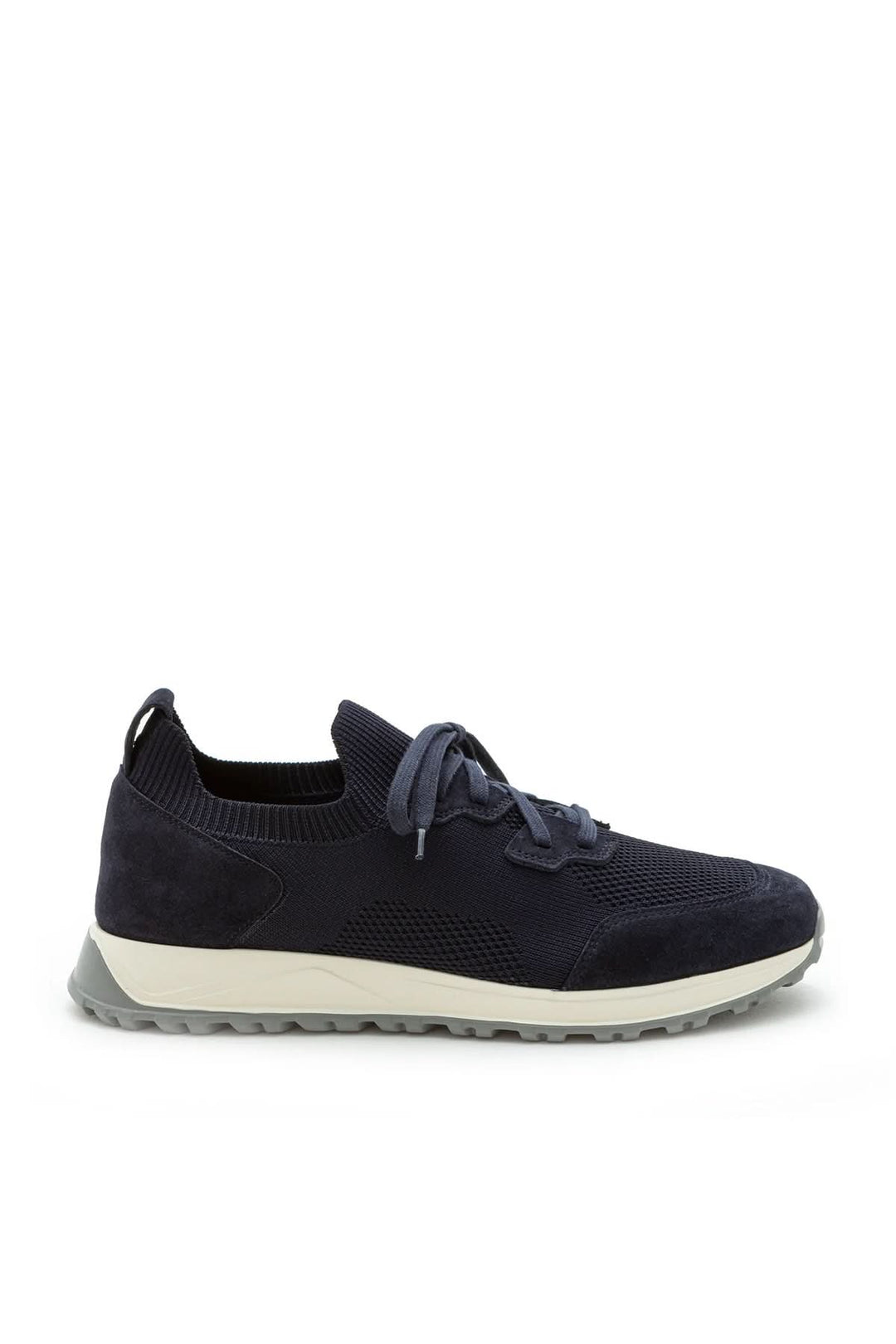 Sneaker homme cuir et tissu extensible, moderne et confortable, avec semelle ultralégère, vue latérale.