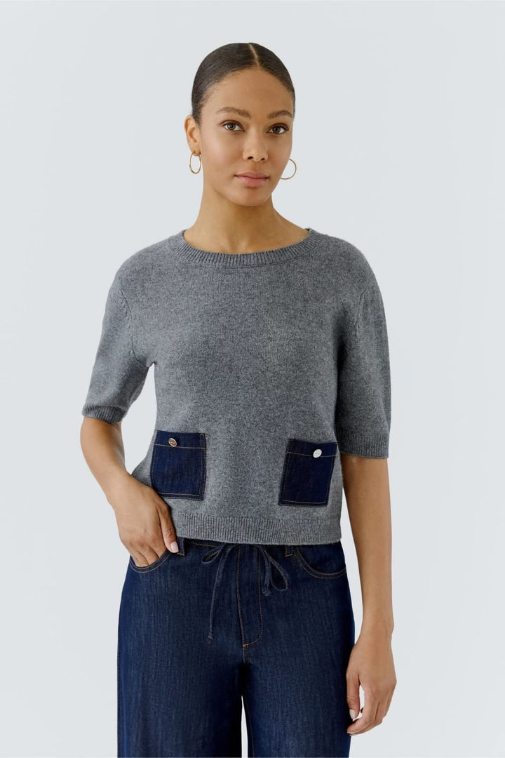 Pull à manches mi-longues bleu denim avec poches vue de face pour femme Oui
