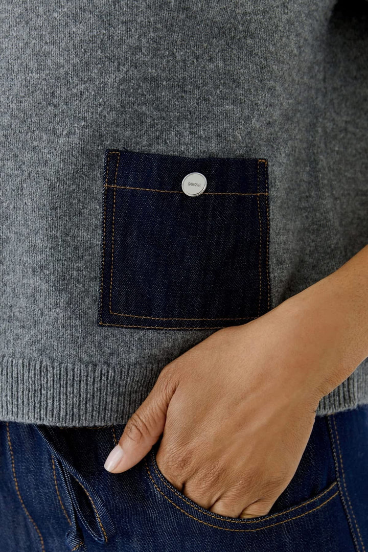 Pull bleu denim à manches mi-longues avec poches vue de face pour femme Oui