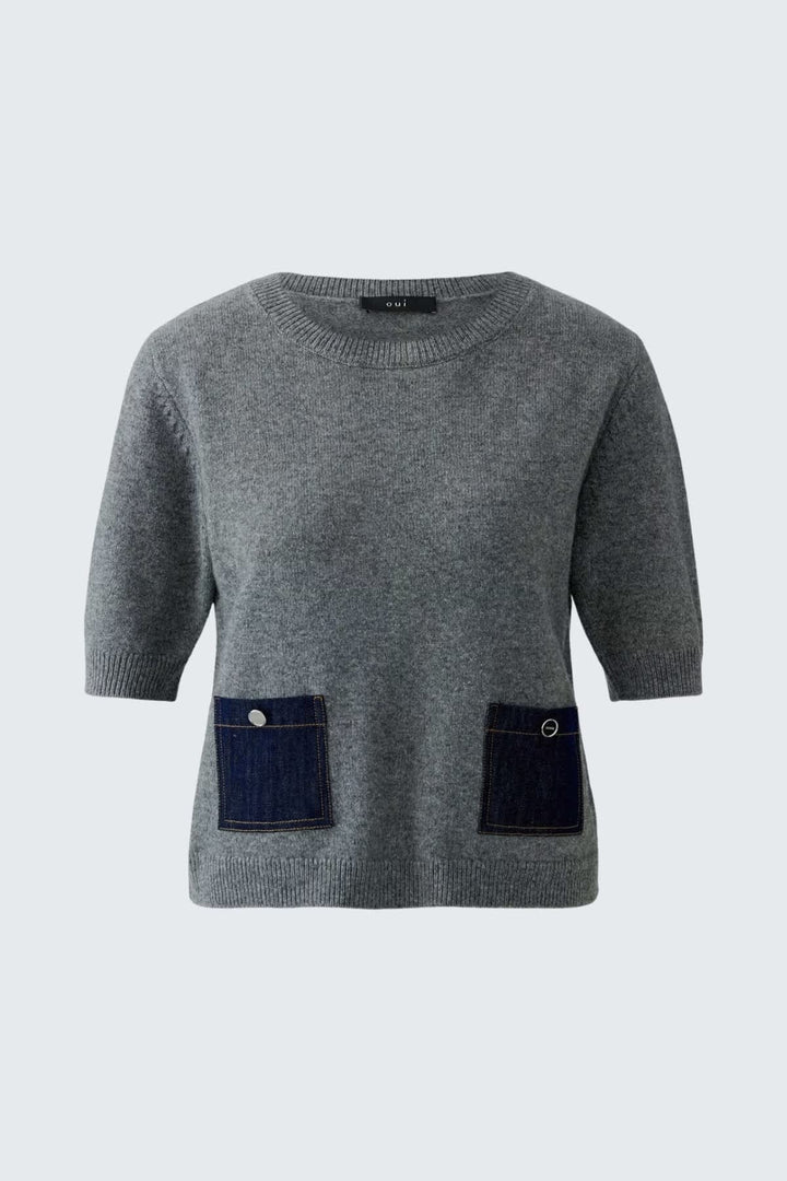 Pull bleu en denim à manches mi-longues avec poches vue de face pour femme Oui