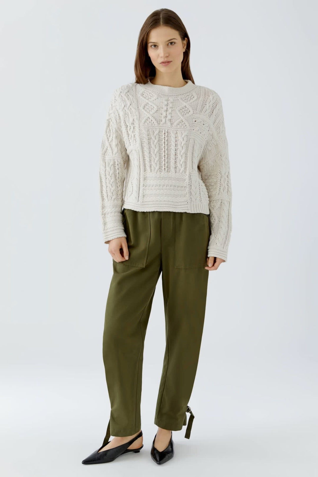 Pull en maille patchwork vue de face pour femme Oui