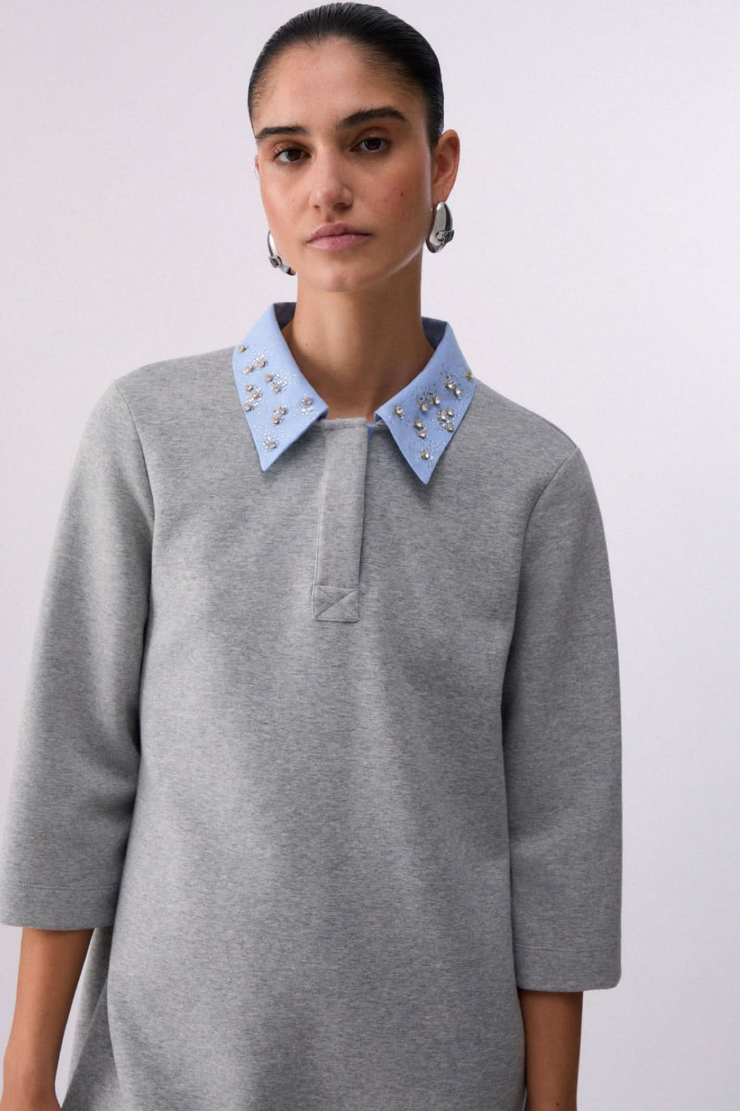 Short dress with an embellished polo neck