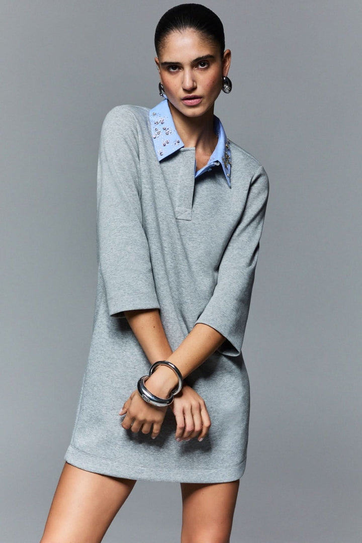 Short dress with an embellished polo neck