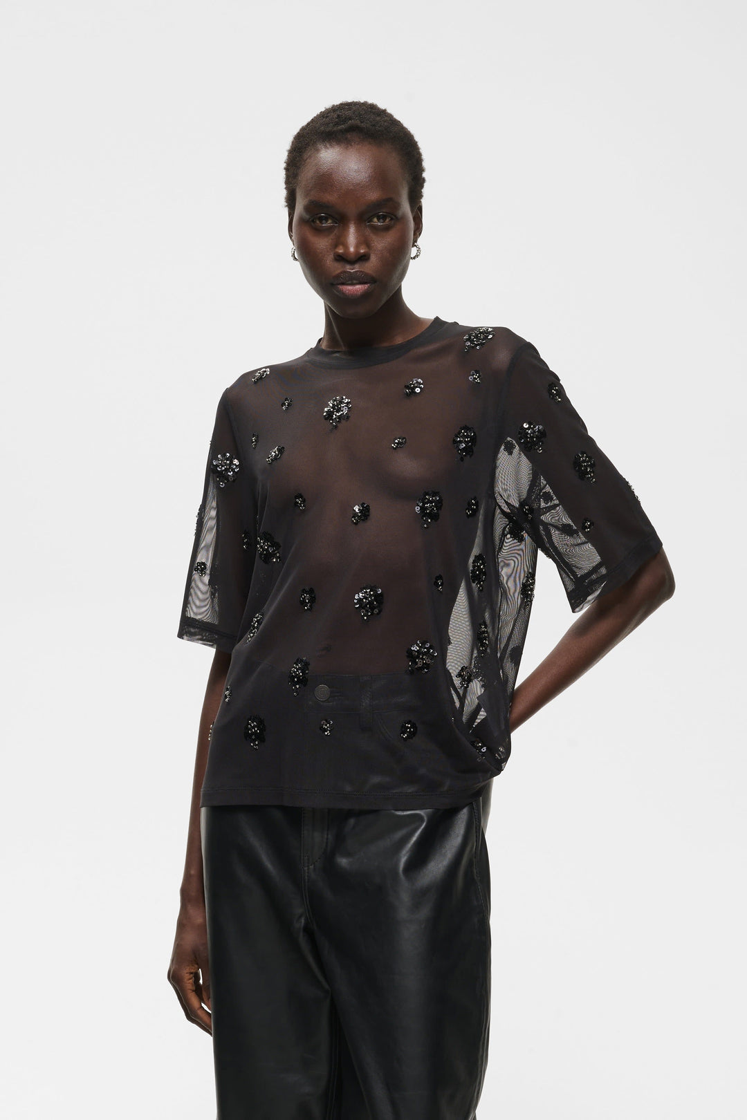 Women’s black Bami T-shirt in sheer tulle with floral sequins, front view Inwear
