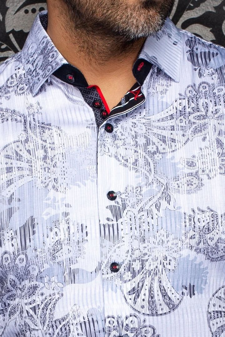 Chemise KALIMANTAN avec imprimé artistique raffiné et col contrastant, coupe ajustée pour un look élégant et sophistiqué.