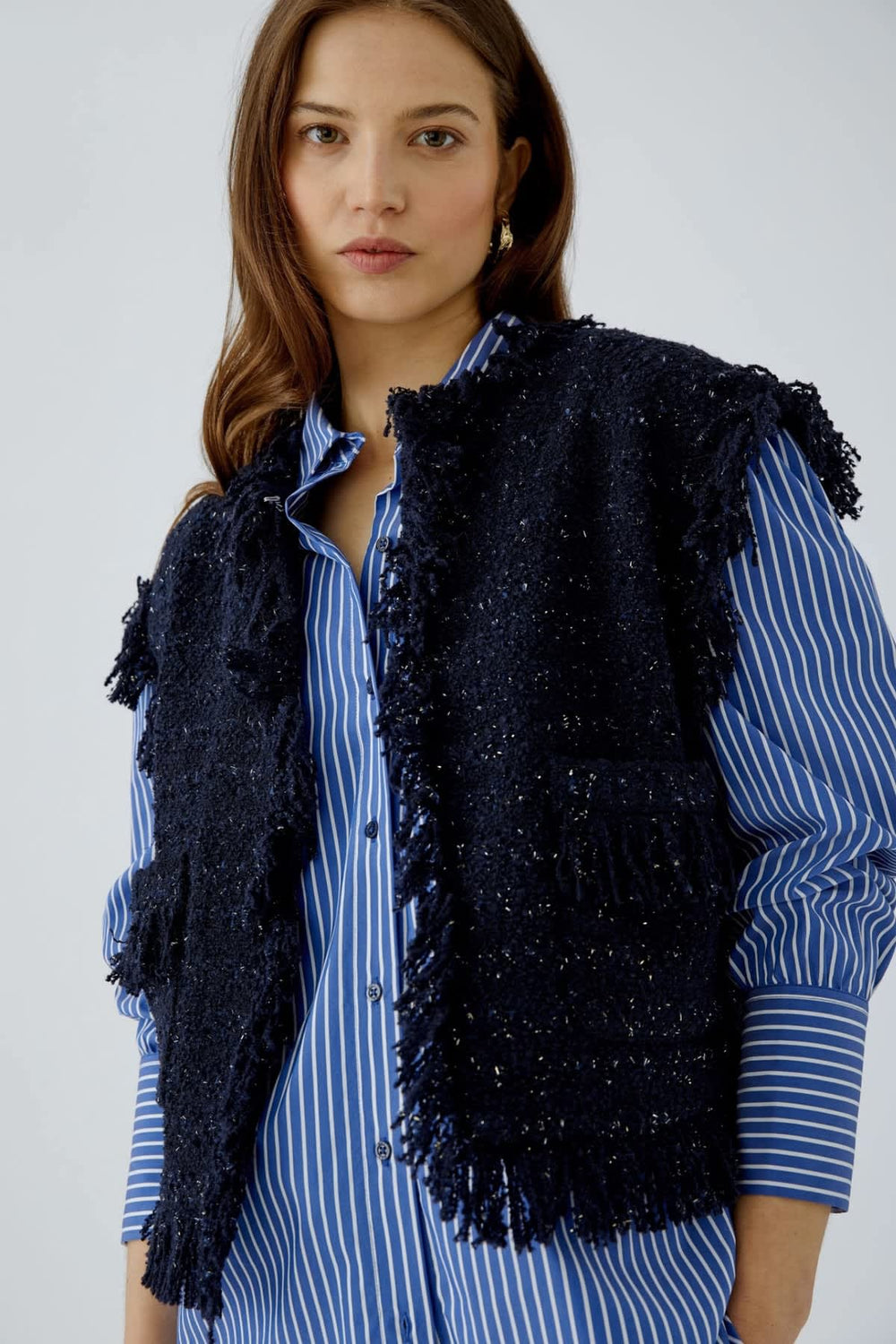 Veste sans manches bouclée à franges pour femme Oui