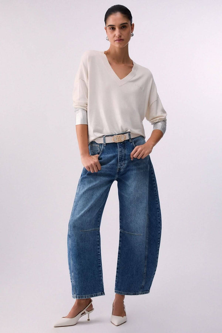 Tricot col en V à manches trois-quarts