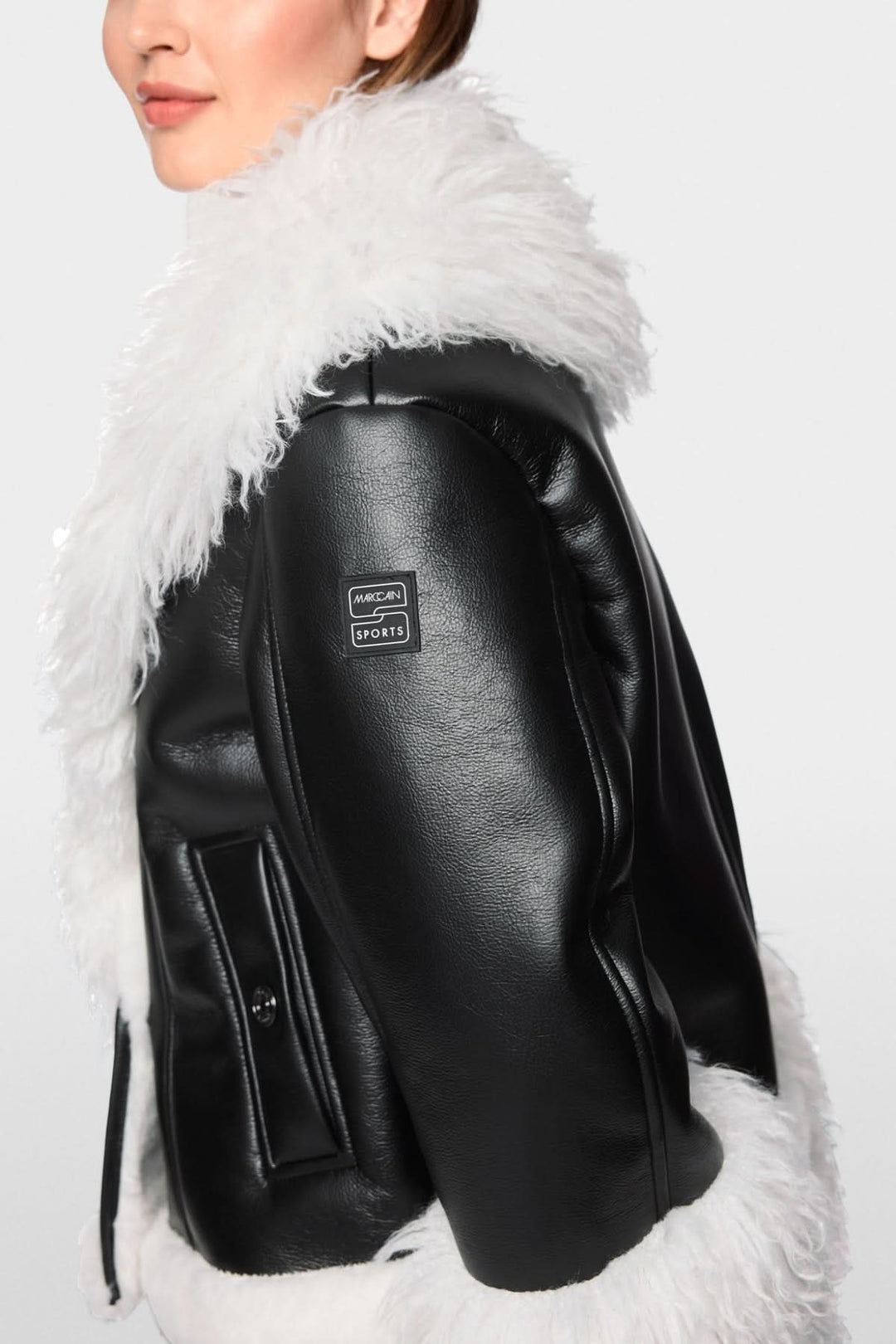 Veste courte en simili-cuir et fausse fourrure