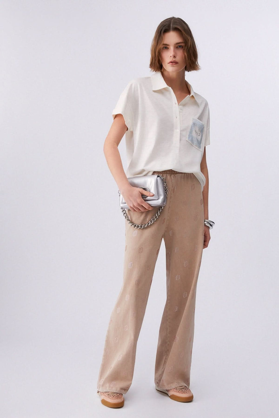 Polo à manches courtes avec poche décorative