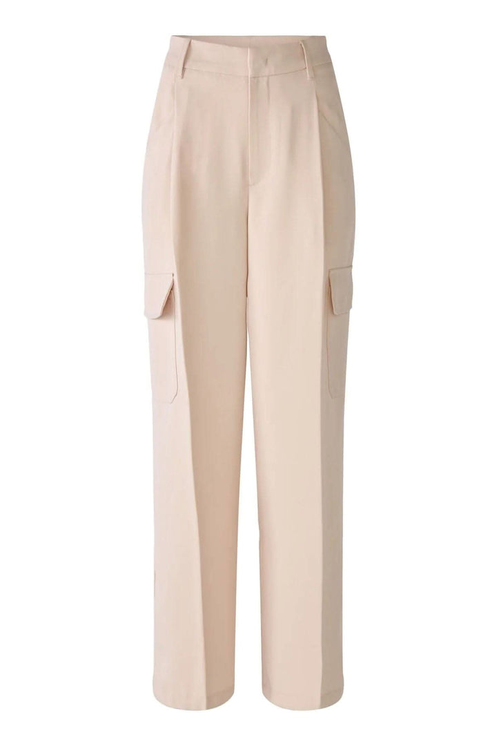 Pantalon cargo coupe large en beige, avec poches latérales et coupe décontractée - mode urbaine.