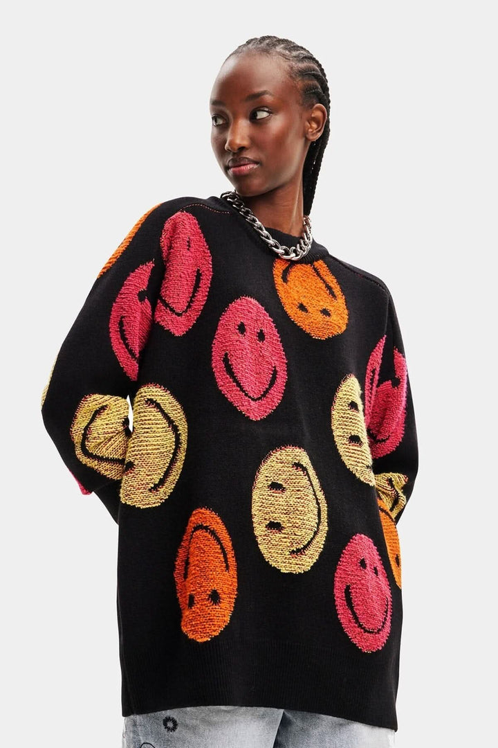 Pull ample à manches longues en grosse maille jacquard avec imprimé de bonhommes sourire multicolores.